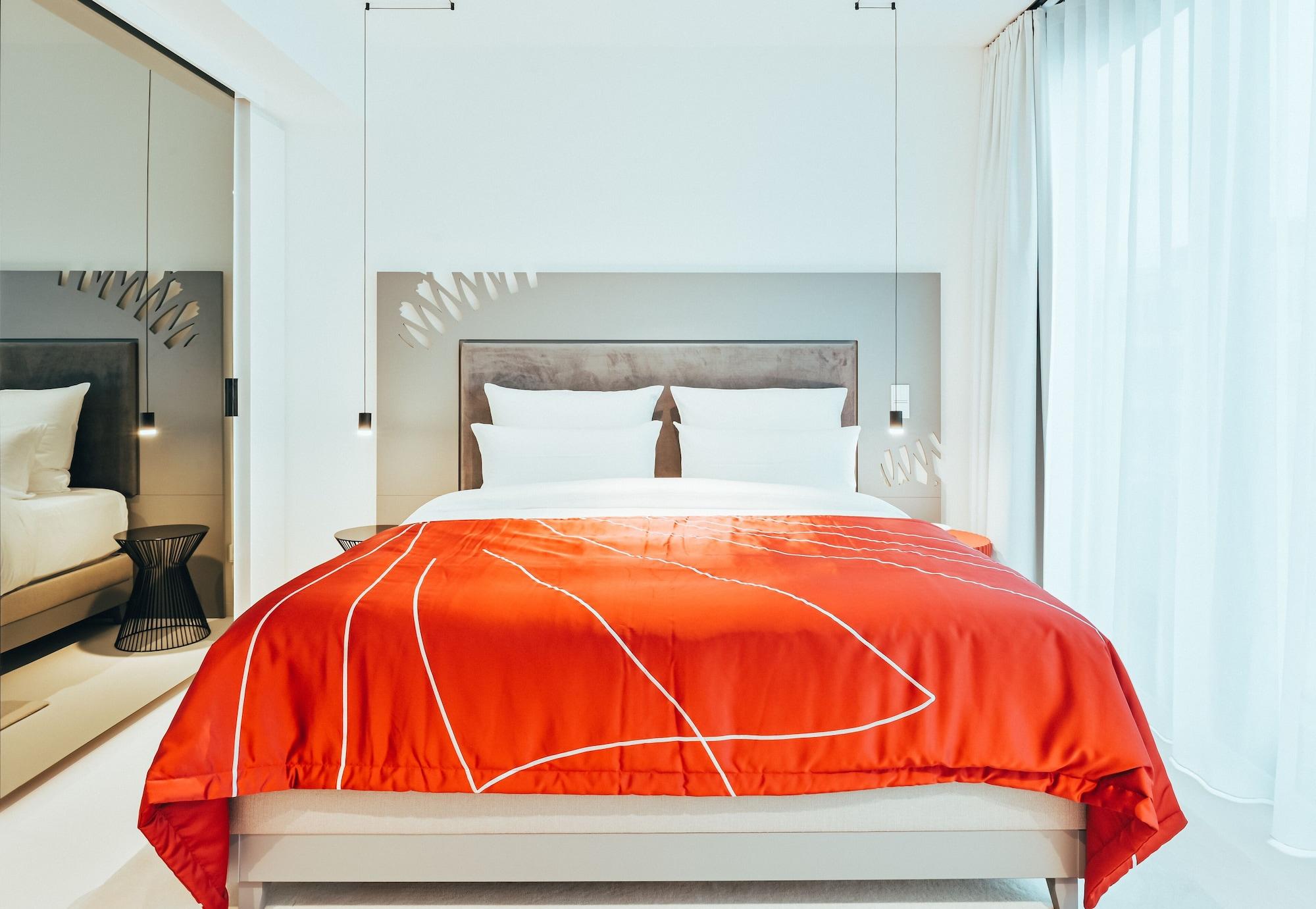 KPM Hotel&Residences Berlín Exterior foto A bed with a duvet